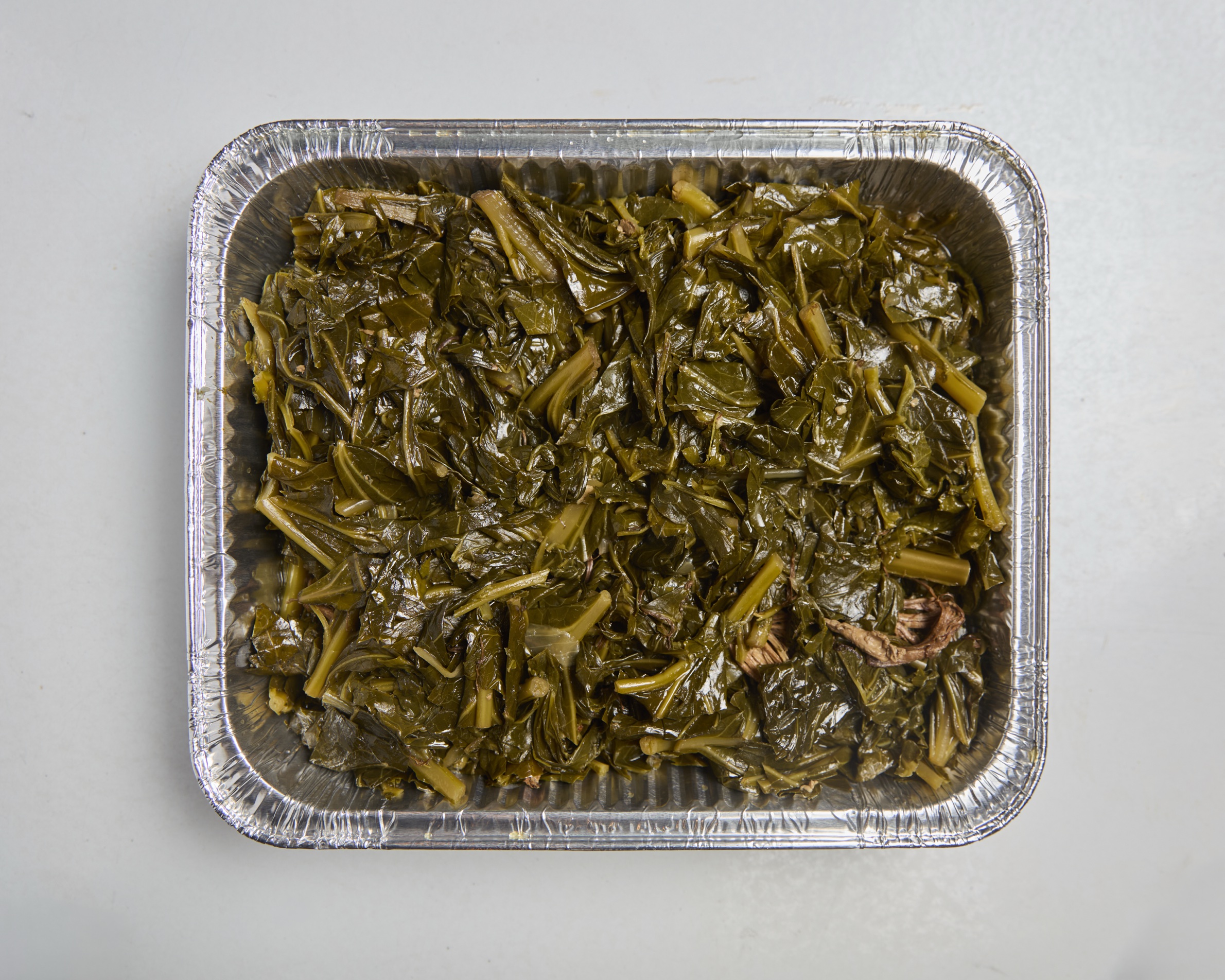 Smoked pork collards half tray