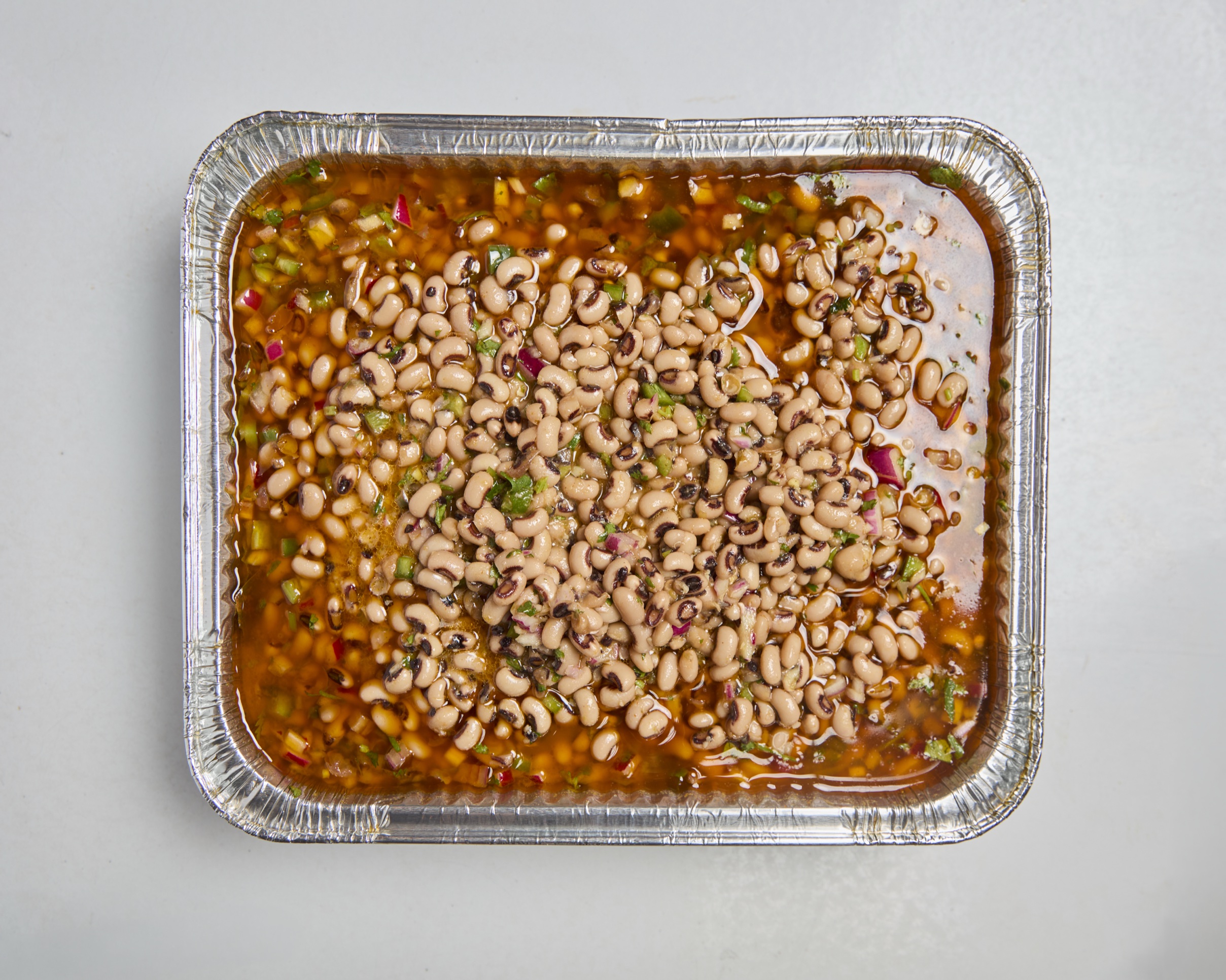 Spicy black-eyed pea salad half tray