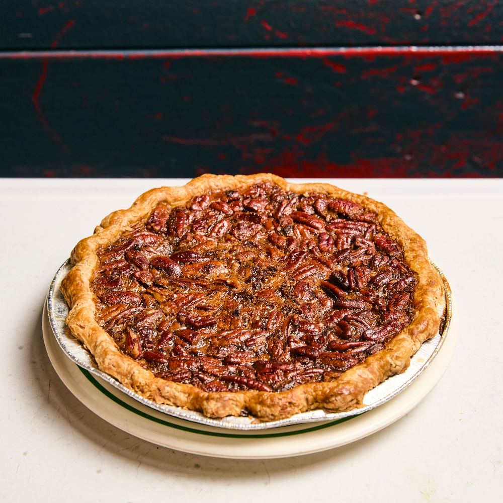 A whole pecan pie fresh from the oven